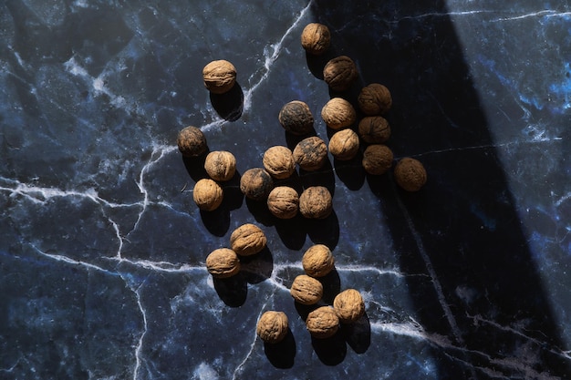 Walnuts on rustic background