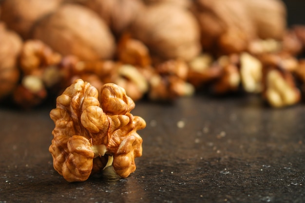 Walnuts, tasty and healthy (Kernels, whole nuts) menu . food background. copyspace. Top view  