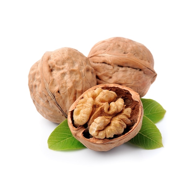 Walnuts with leaves isolated on white