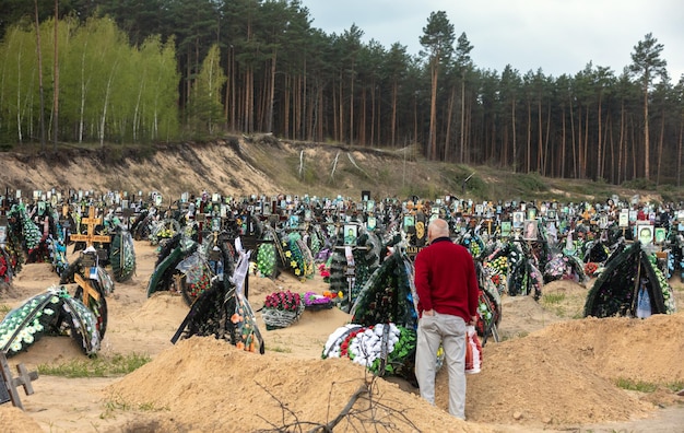 War in Ukraine Cemetery in Irpen with fresh graves