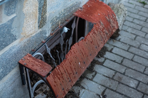 War in Ukraine. Damaged residential buildings. devastation in the yard.