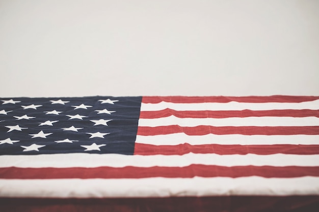 A war veteran's coffin hooded with the US flag.