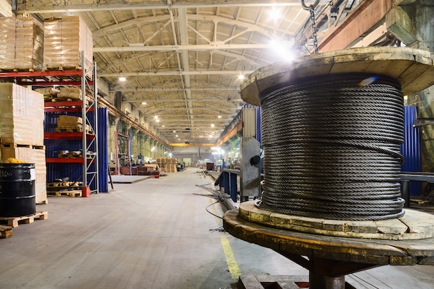 Warehouse industrial enterprise. The storage of steel coils of rope.