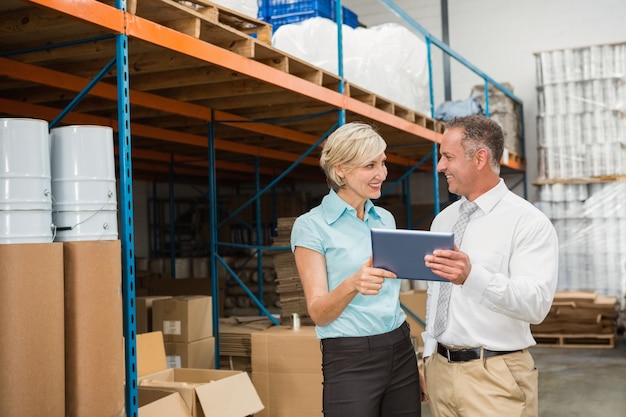 Warehouse managers using tablet pc