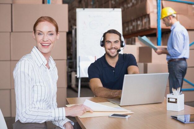 Warehouse team working together on shipment