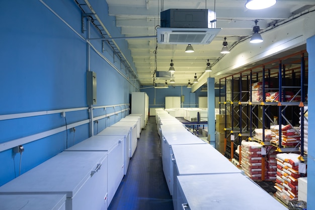 Warehouse with white refrigerators