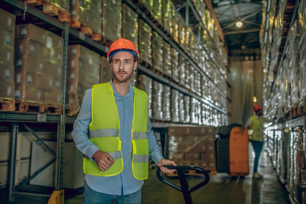 Warehouse worker with helmet