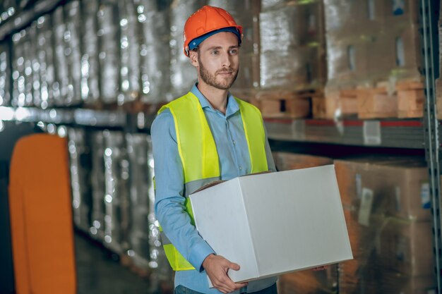 Warehouse worker with helmet