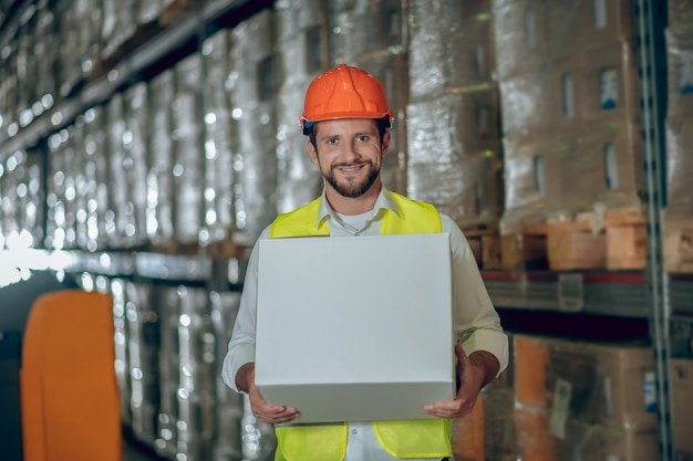 Warehouse worker with helmet