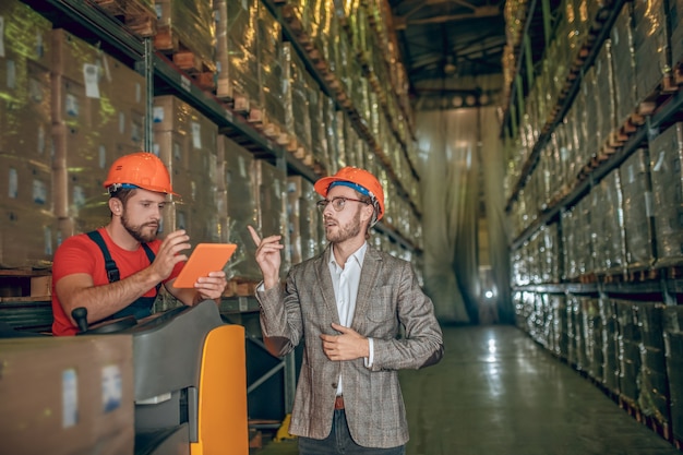 Warehouse worker with helmet