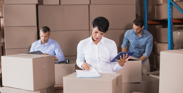 Warehouse workers preparing a shipment