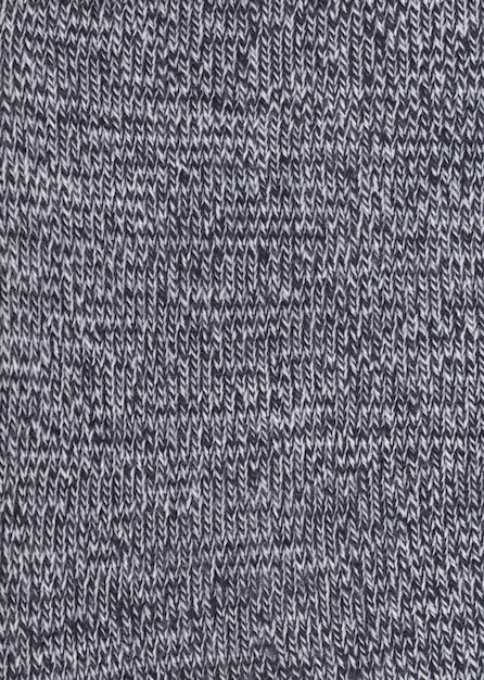 Warm black and white wool sweater texture Knitted fabric background