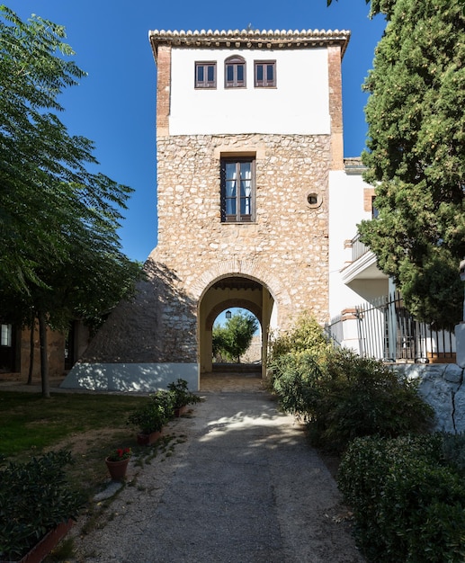 Warm courtyard through archway in Spain