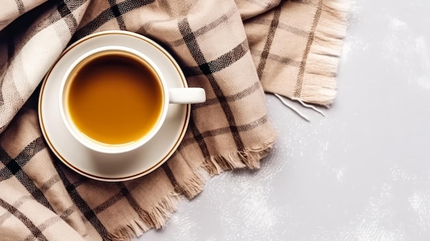 A warm cup of tea on a white background