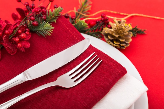 Warm Holiday or Romantic Place Setting with  Silverware and Napkin