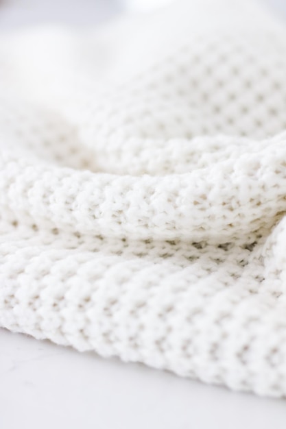 Warm knitted clothes soft and white