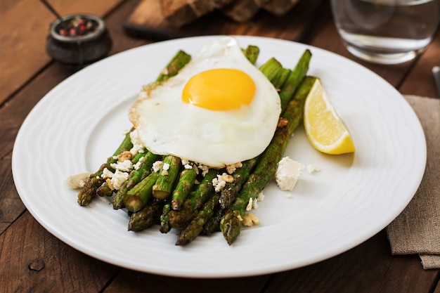 Warm salad of roasted asparagus, feta cheese and eggs