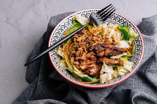 Warm salad with duck breast and walnuts