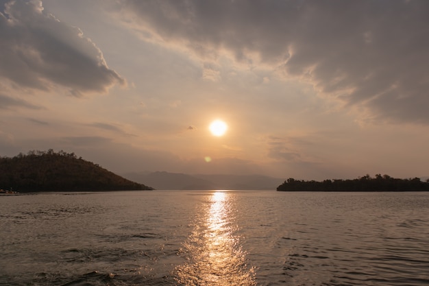 Warm and smooth sunset landscape view of big lake.