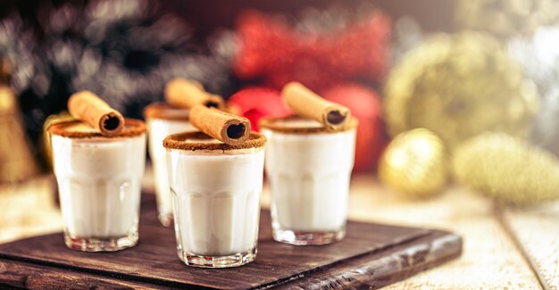 Warm, traditional Christmas eggnog with grated nutmeg and cinnamon.