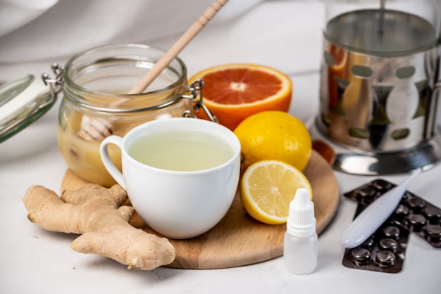 Warming vitamin tea with ginger, lemon, and honey