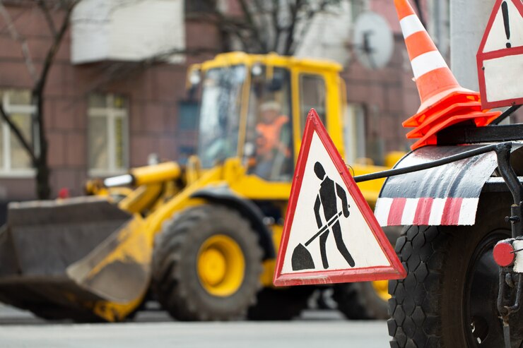 Photo 道路工事現場の道路標識を警告します。