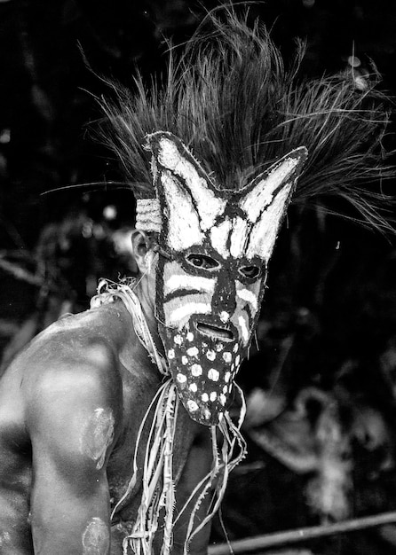 Warrior of the Asmat tribe in a combat mask.