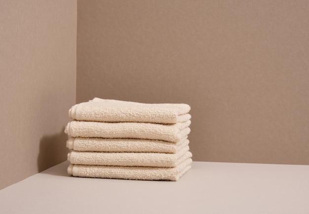 Washed clean fresh towels are on the table Copy space for text