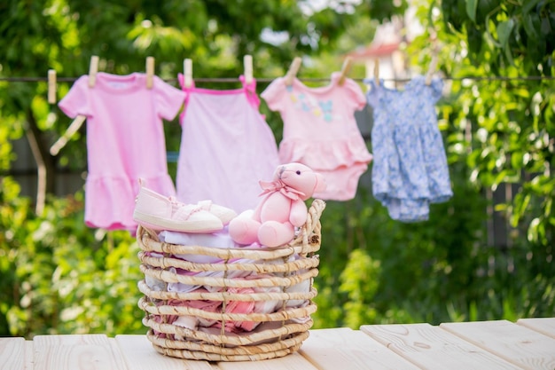 Washing baby clothes Linen dries in the fresh air Selective focus