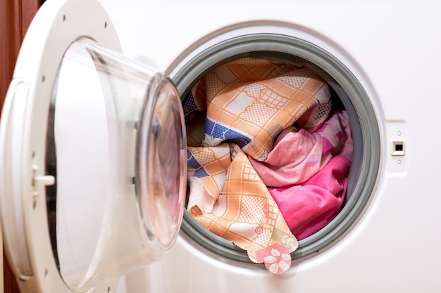 Washing clothes in a laundry