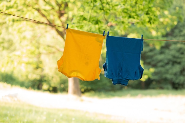 Washing clothes in the summer outdoors