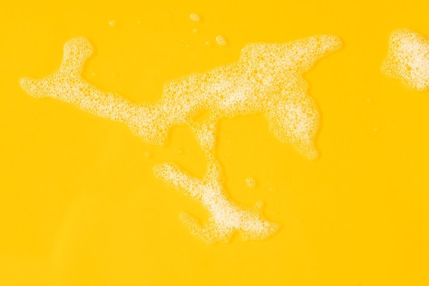黄色の上面図コピースペースの洗浄コンセプトフォームフレーム