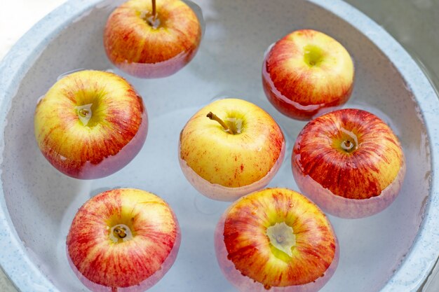 Washing fresh apples in the water