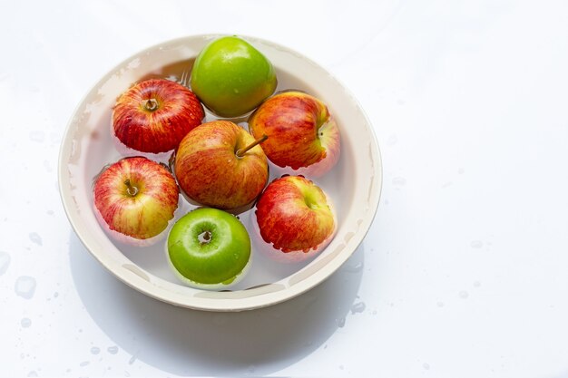 Washing fresh apples in the water