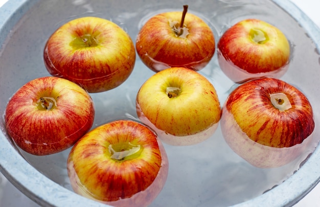 Washing fresh apples in the water