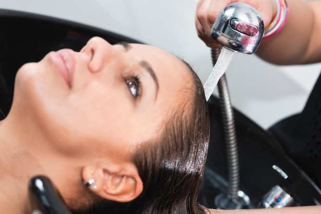 Photo washing hair in hair salon