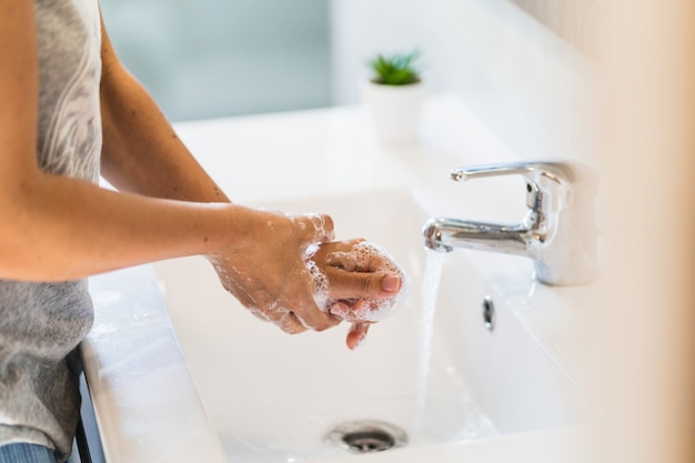 Washing hands rubbing with soap man for corona virus prevention, hygiene to stop spreading coronavirus