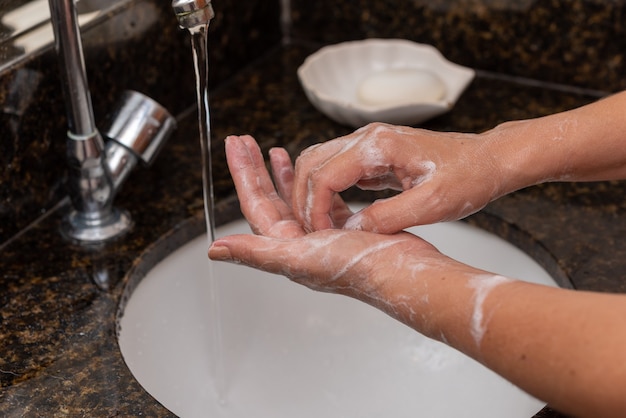 Washing hands with soap properly