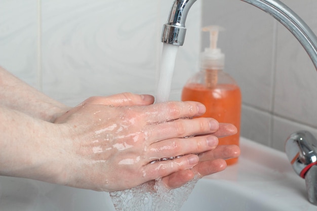 Washing hands with soap