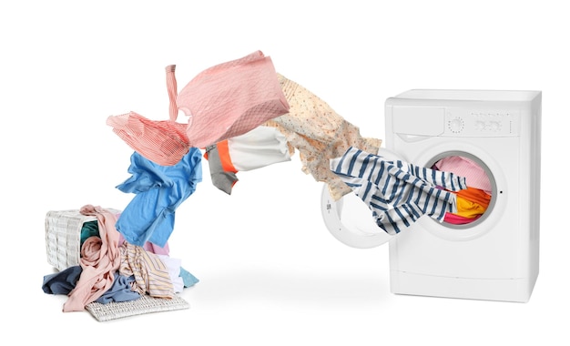 Photo washing machine and flying clothes on white background