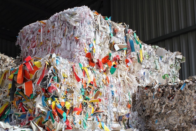 Wastepaper compact texture pile for recycling on sorting plant. Technology of reuse materials. Stack