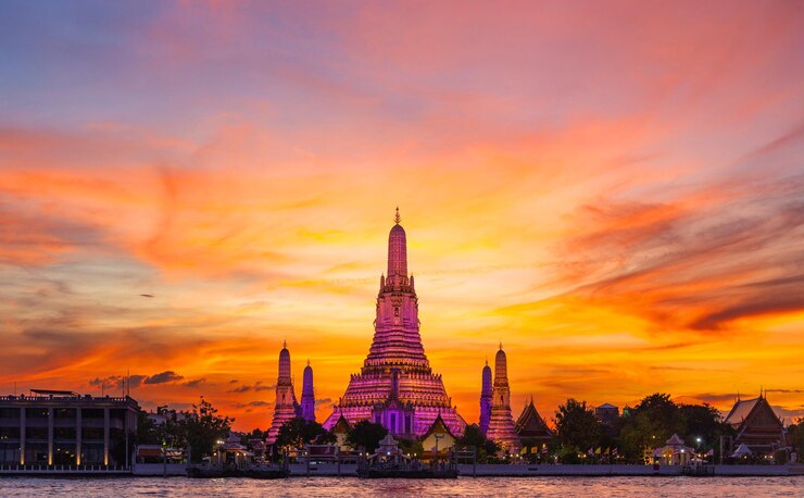 Wat Arun Ratchawararam Ratchawaramahawihan at sunset in bangkok Thailand