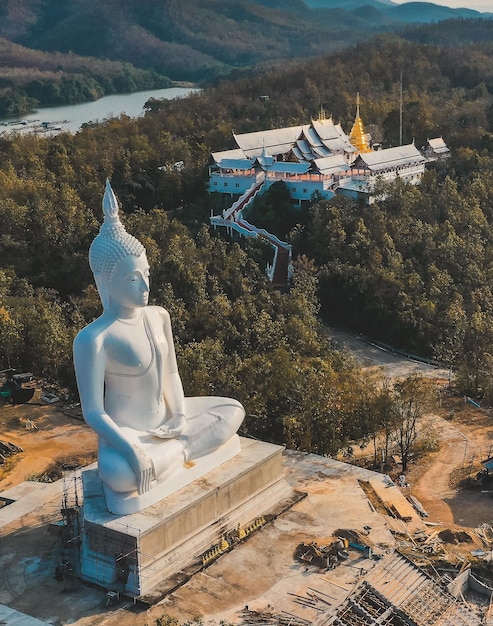 Wat Phrathat Pu Jae buddha and Huai Mae Toek lake in Phrae province Thailand