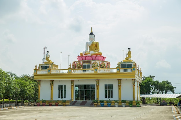 Wat Pong Agas temple is a famous buddhist temple with a large golden pagoda in Thailand