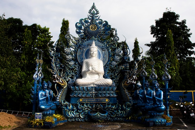 Wat Rong Seur Ten or artistic blue temple for thai people foreign travelers travel visit and respect praying blessing with holy mystery worship at Chiangrai city on July 1 2022 in Chiang Rai Thailand