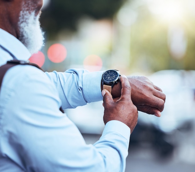 Watch black man and hands in city with time management schedule or waiting for taxi commute Closeup arm and wristwatch of corporate worker in street outdoors for appointment delay or check clock