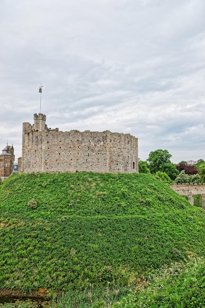 Watch Tower with a flag in Cardiff Castle in Cardiff in Wales of the United Kingdom. Cardiff is the capital of Wales.