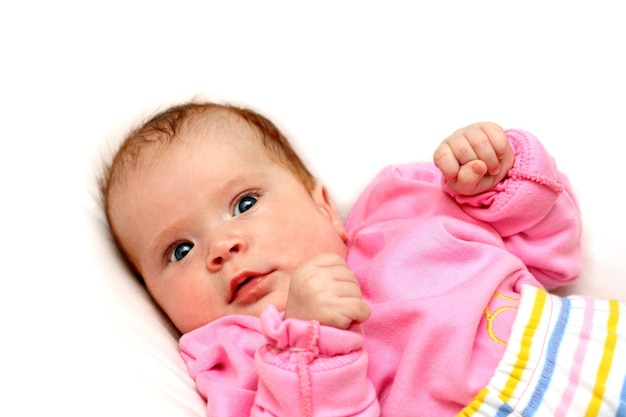 Watchful baby on pillow