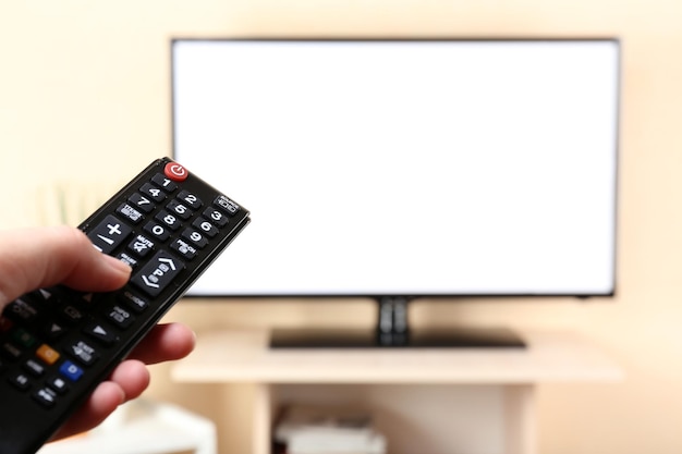 watching tv and using remote controller