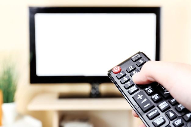 watching tv and using remote controller